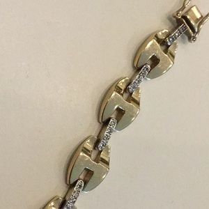 Diamond bracelet  14 k gold. Designer solid with diamonds